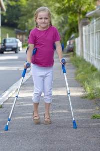 girl with elbow crutches
